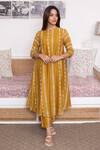 Buy_Vaayu_Yellow Cotton, Muslin Tassels Round Neck Linear Print Kurta With Pant_at_Aza_Fashions