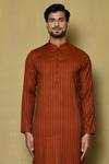 Arihant Rai Sinha_Orange Jacquard Silk Woven Stripe Full Sleeve Pattern Kurta For Men_Online_at_Aza_Fashions