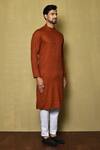 Shop_Arihant Rai Sinha_Orange Jacquard Silk Woven Stripe Full Sleeve Pattern Kurta For Men_Online_at_Aza_Fashions