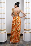 Shop_Ahi Clothing_Orange Heavy Crepe Printed Abstract Asymmetric Skirt Bustier Set _at_Aza_Fashions