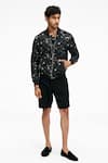 Buy Terra Luna Black Cotton Embroidery Berghain Ecofoil Sparkle Print Bomber Jacket at Aza Fashions Buy_Terra Luna_Black Cotton Embroidery Berghain Ecofoil Sparkle Print Bomber Jacket _at_Aza_Fashions