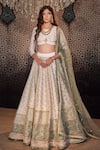 Buy_Cedar & Pine_Ivory Raw Silk Embroidered Sequin Round Floral Jaal Lehenga Set _at_Aza_Fashions
