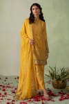 Buy_VARUN CHHABRA_Yellow Chanderi Block Printed And Embellished Foil Round Collar Floral Kurta Set _at_Aza_Fashions