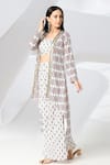 Shop_Adamantia_Off White Muslin Silk Ikat Print Cape Flared Pant Set_at_Aza_Fashions