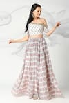 Buy_Adamantia_Off White Muslin Silk Ikat Print Lehenga And Blouse Set _at_Aza_Fashions