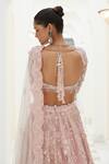 Shop_Nitika Gujral_Pink Net Embroidered Sequin Sweetheart 3d Floral Bridal Lehenga Set _at_Aza_Fashions
