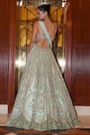 Shop_Nitika Gujral_Green Net, Satin Sequins, Crystals, Floral Bloom Embroidered Bridal Lehenga Set _at_Aza_Fashions