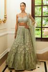 Buy_Nitika Gujral_Green Net Scallop Spark Embroidered Lehenga Blouse Set_at_Aza_Fashions