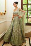 Buy_Nitika Gujral_Green Net Scallop Spark Embroidered Lehenga Blouse Set_Online_at_Aza_Fashions