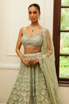 Shop_Nitika Gujral_Green Net Embroidery Tonal Silver Beads Scallop Spark Bridal Lehenga Set _Online_at_Aza_Fashions