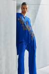 Shop Namrata Joshipura Blue Satin Embellished Stone Mandarin Collar Riverleaf Floral Asymmetric Tunic at Aza Fashions Shop_Namrata Joshipura_Blue Satin Embellished Stone Mandarin Collar Riverleaf Floral Asymmetric Tunic _at_Aza_Fashions