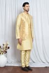 Aryavir Malhotra_Gold Jacquard Buttercup Flora Woven Nehru Jacket _at_Aza_Fashions