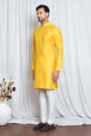 Shop_Aryavir Malhotra_Yellow Silk Plain Mandarin Collar Kurta _Online_at_Aza_Fashions