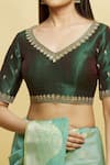 Samyukta Singhania_Green Mulberry Silk Embroidered Floral V Neck And Zari Blouse _at_Aza_Fashions