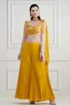 Nishta Studio_Yellow Blouse Swiss Net With Silk Embroidery Cutdana Flared Pant Set  _Online_at_Aza_Fashions