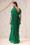 Shop_K-Anshika_Green Georgette Sequins, Beads V-neck Ruffled Pre-draped Saree With Blouse _at_Aza_Fashions