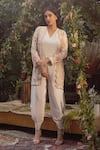 Buy_Samatvam by Anjali Bhaskar_Ivory Blended Crepe Embroidered Thread V Shaheen Dhoti Jumpsuit And Jacket Set _at_Aza_Fashions