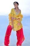 Foram Patel_Yellow Natural Crepe Print Tulip Bloom Scalloped Neck Kurta With Flared Pant _Online_at_Aza_Fashions