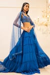 Buy_Foram Patel_Blue Georgette Embroidered Thread Tiered Lehenga Set With Mirrorwork Blouse _at_Aza_Fashions