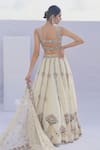 Shop_Foram Patel_Beige Organza Embroidered Cutdana V-neck Lotus Embellished Bridal Lehenga Set _at_Aza_Fashions