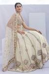 Buy_Foram Patel_Beige Organza, Net Cut Work, Lotus Cutdana Embellished Bridal Lehenga Set _Online_at_Aza_Fashions