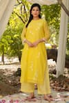 Buy_Charu Makkar_Yellow Chanderi Hand Paint Daisy Frilly Round Kurta With Pant _at_Aza_Fashions