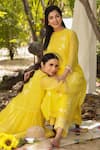 Charu Makkar_Yellow Chanderi Hand Paint Daisy Frilly Round Kurta With Pant _Online_at_Aza_Fashions