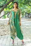 Buy_Nikita Vishakha_Green Net, Silk Embroidery V-neck Jumpsuit With Floral Pattern Cape _at_Aza_Fashions