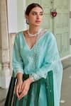 Charu Makkar_Blue Chanderi Silk Embroidered Floral V Neck Asymmetric Suit Palazzo Set_at_Aza_Fashions