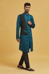 Arihant Rai Sinha_Blue Silk, Jacquard Embroidery Stone Embellished Drape Sherwani With Churidar _Online_at_Aza_Fashions