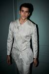 Shop_Jigar & Nikita_White Jersey, Rayon Embroidery Leaf Textured Jacket And Pant Set _at_Aza_Fashions