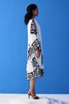 Shop_Pleats By Aruni_Black Crepe Boat Neck Abstract Bloom Print Pleated Dress_Online_at_Aza_Fashions