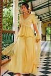 Buy 1999ad By Amita & Deepak Yellow Organza Cut Work, Embroidery, Zari V-neck Peplum Top Sharara Set Online at Aza Fashions Buy_1999ad By Amita & Deepak_Yellow Organza Cut Work, Embroidery, Zari V-neck Peplum Top Sharara Set _Online_at_Aza_Fashions