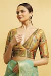 Samyukta Singhania_Green Brocade Blossom Art Plunging V Neck Woven Blouse _Online_at_Aza_Fashions