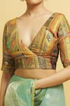 Samyukta Singhania_Green Brocade Blossom Art Plunging V Neck Woven Blouse _at_Aza_Fashions