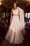 Buy_Rococo_Pink Net Pearls, Sequins, Tassels Floral Embroidered Bridal Lehenga Set _at_Aza_Fashions