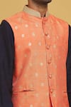 Shop_Seirra Thakur_Orange Silk Applique Embroidered Floral Motifs Nehru Jacket _at_Aza_Fashions