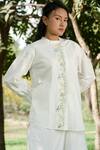 Shop_Ahmev_Ivory Cotton Embroidery Mandarin Collar Floral Pintuck Panel Shirt _at_Aza_Fashions