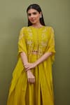 Sandhya Shah_Yellow Cape Organza Hand Embroidered Cutdana Round Lehenga Set_Online_at_Aza_Fashions
