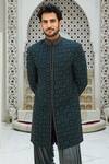 Nitika Gujral_Blue Raw Silk Embroidered Resham Sherwani Set _Online_at_Aza_Fashions
