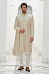 Buy_Nitika Gujral_Cream Silk, Cotton, Tussar, Lycra Crystals, Geometric Pattern Raw Sherwani Set _at_Aza_Fashions