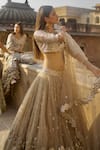 Abhinav Mishra_Gold Net Embellished Mirror Leaf Bridal Lehenga Set_at_Aza_Fashions