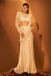 Buy_Ritika Mirchandani_Ivory Net Embroidery Bead Round Nallie Lehenga Saree With Blouse  _at_Aza_Fashions