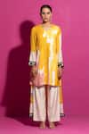 Buy_SAKSHAM & NEHARICKA_Yellow Cotton Satin Print Abstract Scalloped Asymmetric Kurta  _at_Aza_Fashions