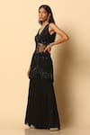 MeenaGurnam_Black Viscose Georgette Embroidered Stones V Neck Peplum Top And Sharara Set _at_Aza_Fashions