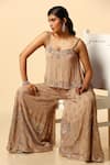 Shop_MeenaGurnam_Beige Viscose Georgette Embroidered Sequins V Neck Top And Sharara Set_at_Aza_Fashions