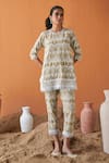 Buy_Qala Clothing_Green Cotton Tassels, Embroidery Round Neck Flora Schiffli Top And Pant Set _at_Aza_Fashions