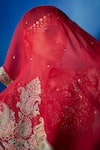 Mrunalini Rao_Red Leather, Organza, Silk Embroidery, Zari Round Radha Raw Bridal Lehenga Set _at_Aza_Fashions
