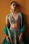 Mrunalini Rao_Green Lehenga And Blouse Raw Silk Embroidery Mudra Bridal Set _Online_at_Aza_Fashions