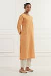 Shop_Kamaltaas_Orange Linen Hand Embroidery Floral Round Neck Pitta Kurta With Pant  _Online_at_Aza_Fashions